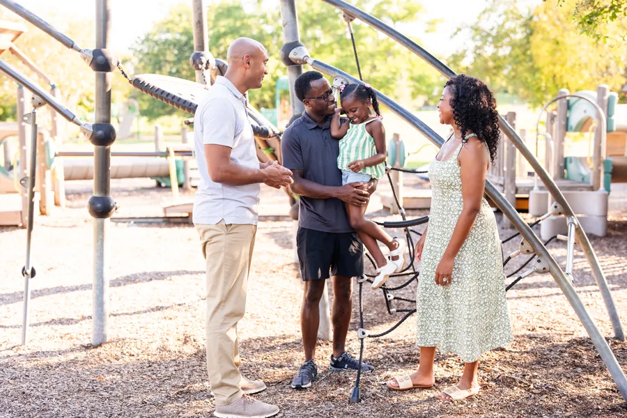 Shomari Figures with community members, photo 10 of 39